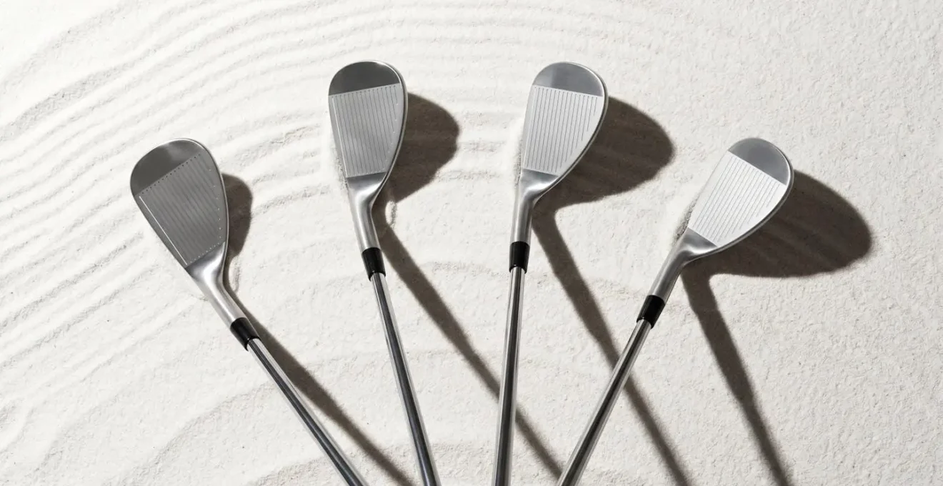 Overhead view of multiple wedges arranged showing progressive lie angles and loft differences for optimal distance gapping
